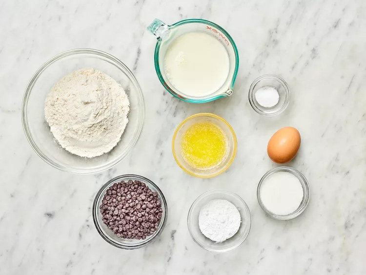 Pancake ingredients laid out on table